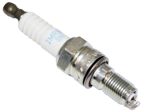 NGK spark plug installed in engine well demonstrating correct fit
