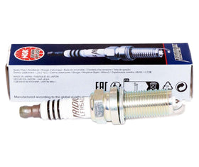 NGK iridium fine-wire center electrode close-up showing precise spark tip for efficiency
