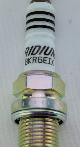 NGK iridium electrode close-up displaying fine tip for precise spark benefit