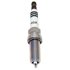 NGK spark plug installed in engine illustrating reliable ignition performance benefit