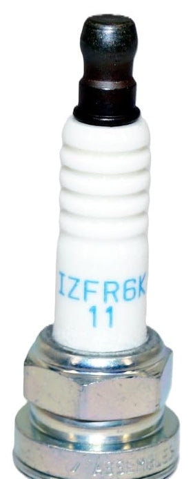NGK IZFR6K11 insulator ribs close-up preventing flashover