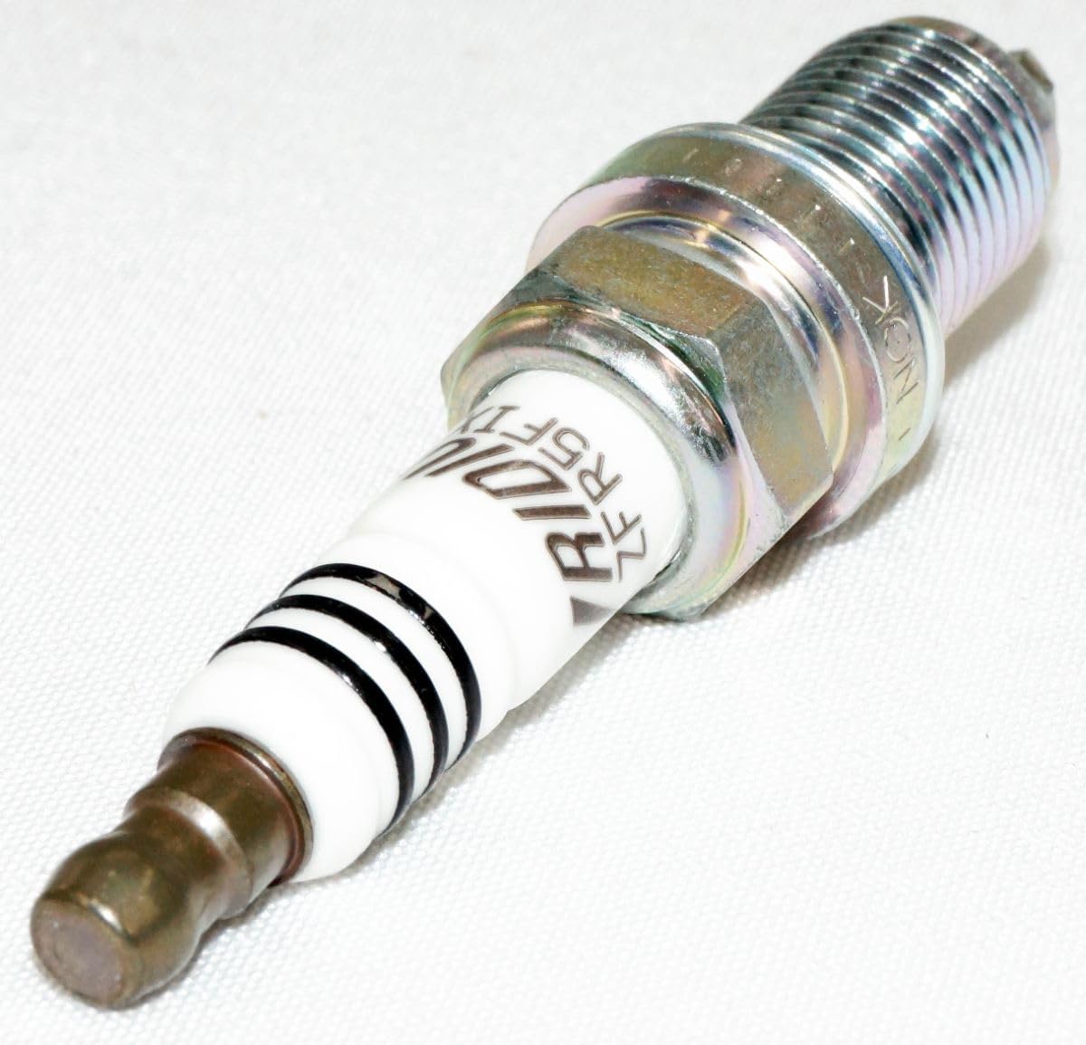 NGK label ZFR5FIX-11 close-up confirming exact replacement part benefit