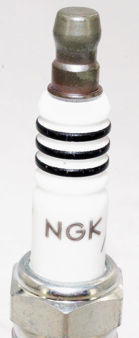 NGK plug gap detail with measurement illustrating proper setup and consistency