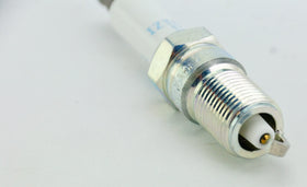 NGK plug gap measurement detail showing easy pre-install adjustment benefit