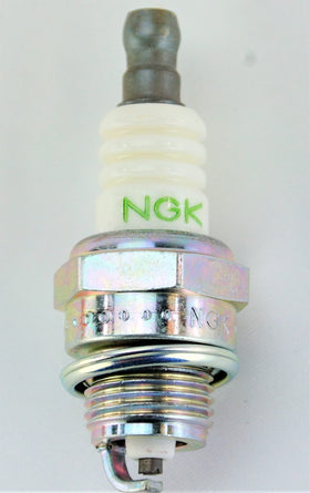 NGK spark plug installed in engine demonstrating practical replacement benefit