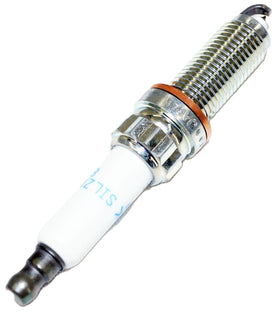 NGK plug next to ruler showing dimensions for proper fitment confirmation