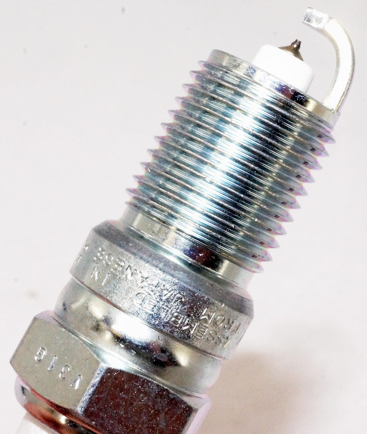 NGK spark plugs installed in engine bay showing reliable OEM-style performance