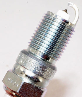 NGK spark plugs installed in engine bay showing reliable OEM-style performance