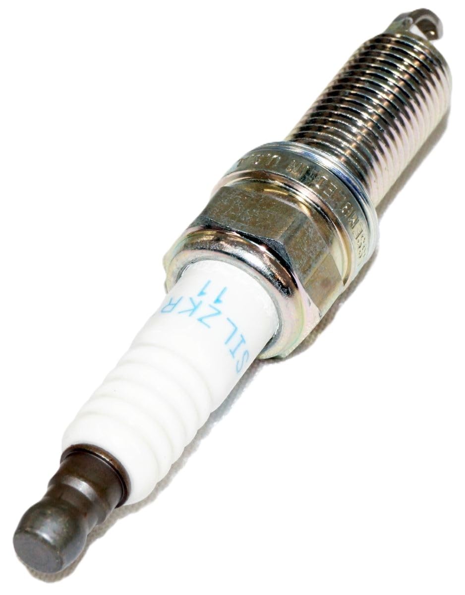 NGK installed in spark plug well demonstrating correct in-engine fit