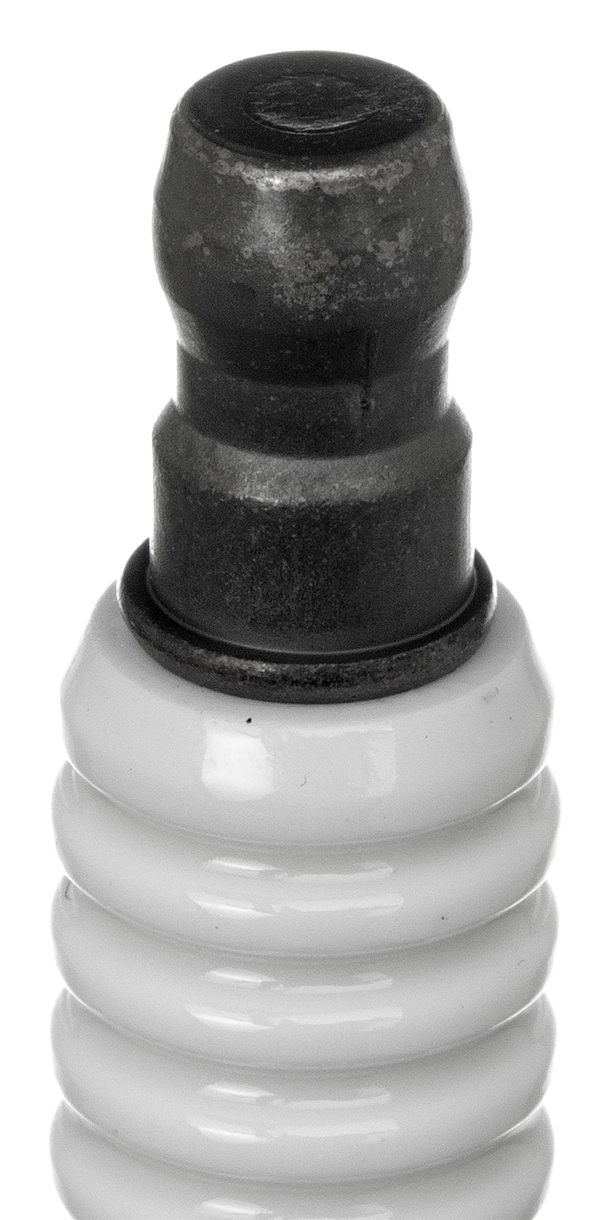 NGK LFR7A close-up of electrode and porcelain, NGK precision for reliable ignition