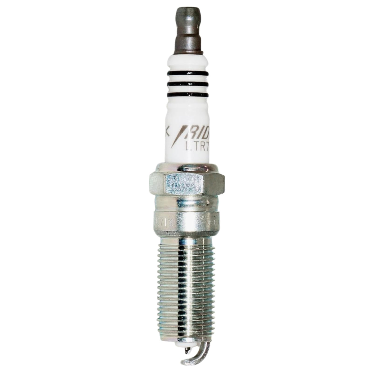 NGK spark plug installed in engine illustrating proper seating and benefit