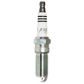 NGK spark plug installed in engine illustrating proper seating and benefit