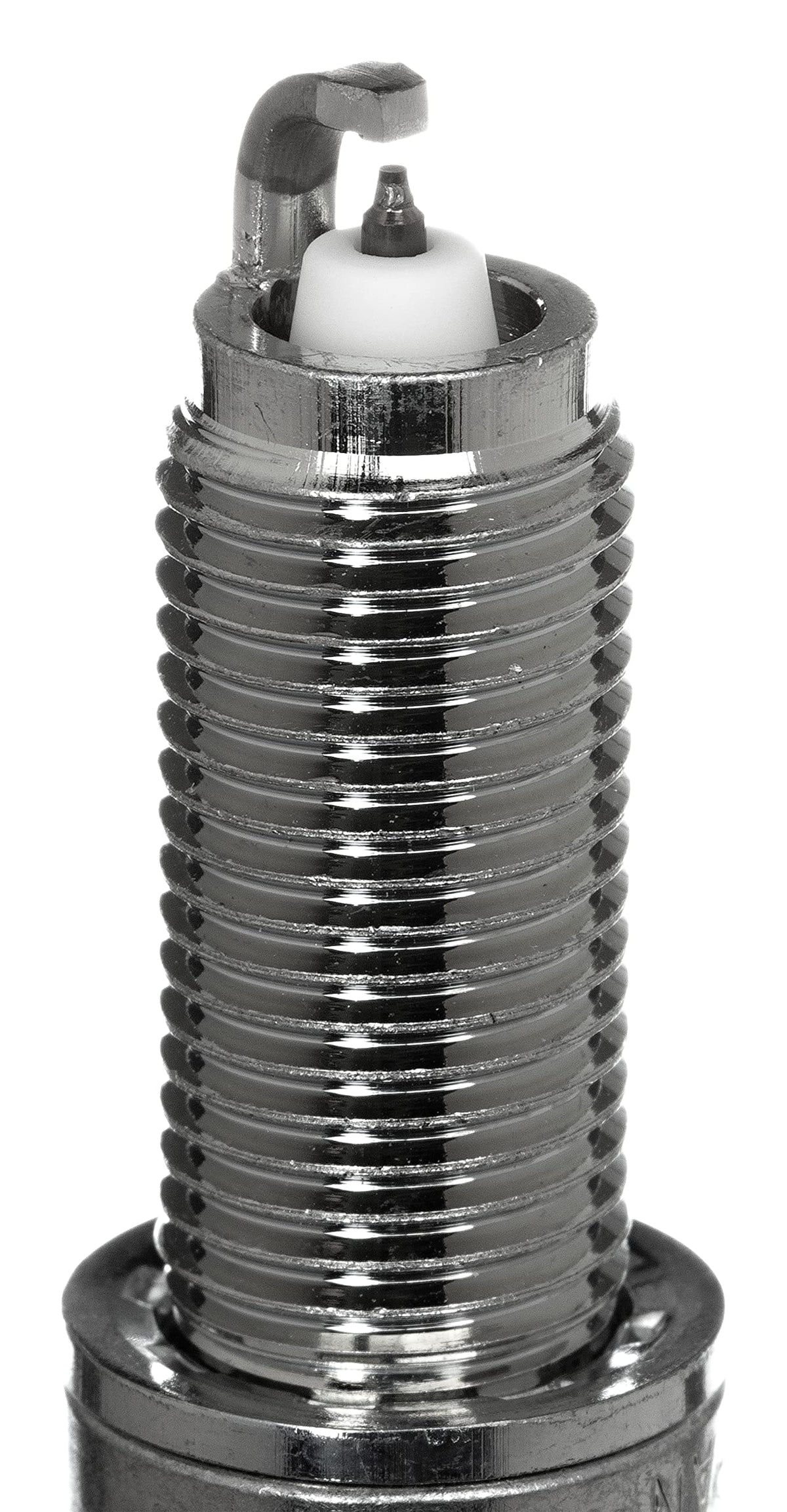 NGK spark plug seated in socket demonstrating correct installation fit