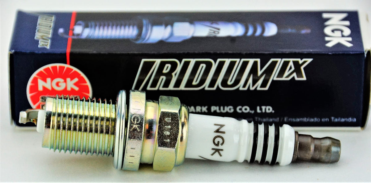 NGK spark plug installed in engine bay demonstrating reliable start and response