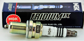 NGK spark plug installed in engine bay demonstrating reliable start and response