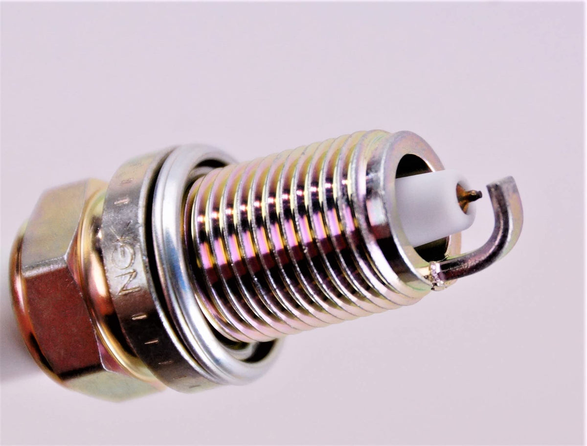 NGK spark plug side profile showing threads and reach for correct engine fitment