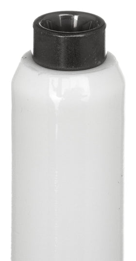 NGK spark plug beside ruler showing size and compact package dimensions