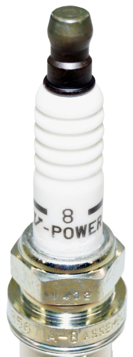 NGK spark plugs in hand for scale showing eight-pack quantity and straightforward home-install benefit