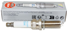 Close-up of NGK electrode and ceramic insulator highlighting durable construction