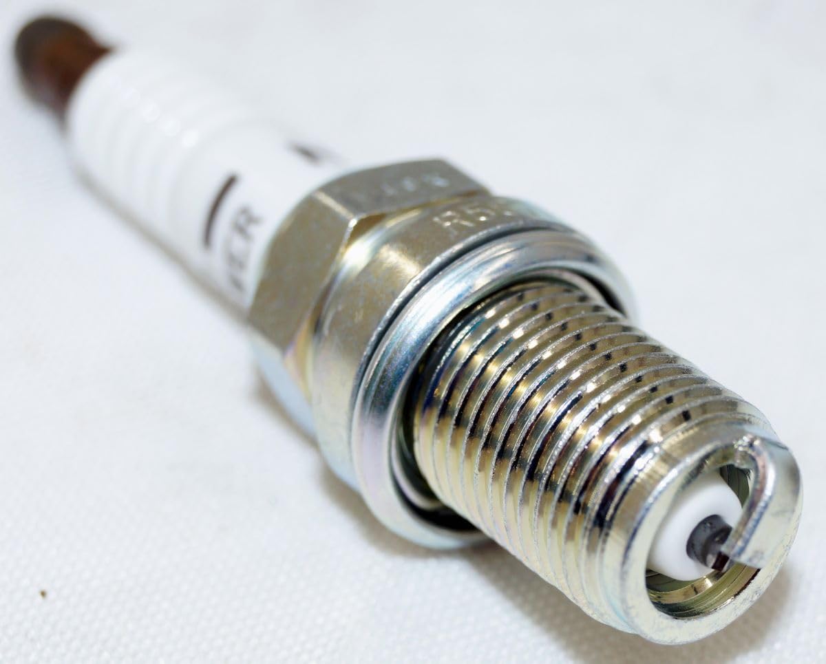 NGK V-Power electrode close-up revealing copper core for improved heat transfer