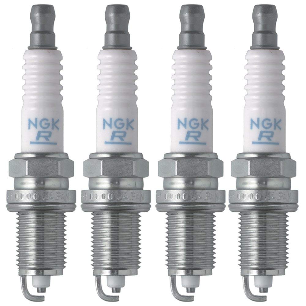 Close-up of NGK ZFR5F-11 electrode showing V-groove and concave ground for improved spark