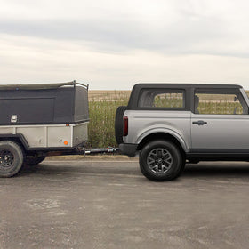 Nilight hitch next to rear bumper showing correct scale and fit benefit