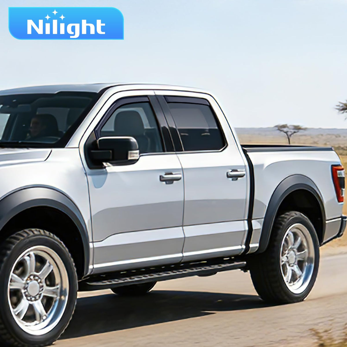 Nilight visors on F-150 during rain demonstrating ventilation without water entry benefit