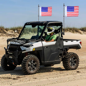 Nilight lifestyle shot on dunes showing visibility and durability benefit