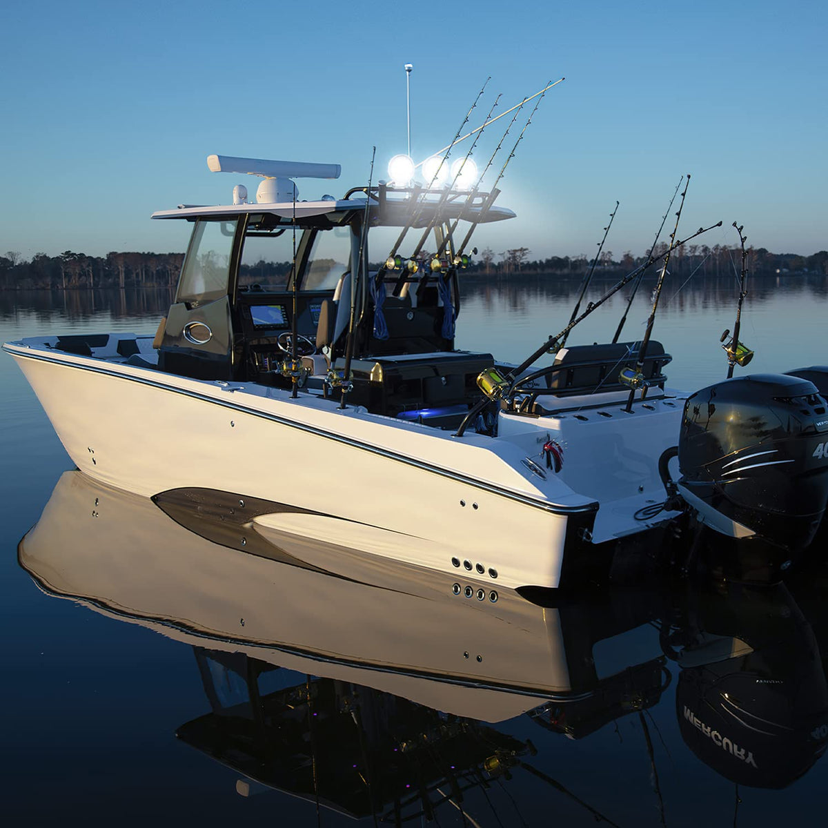 Nilight illuminating shoreline during night fishing showing improved visibility and safety benefit