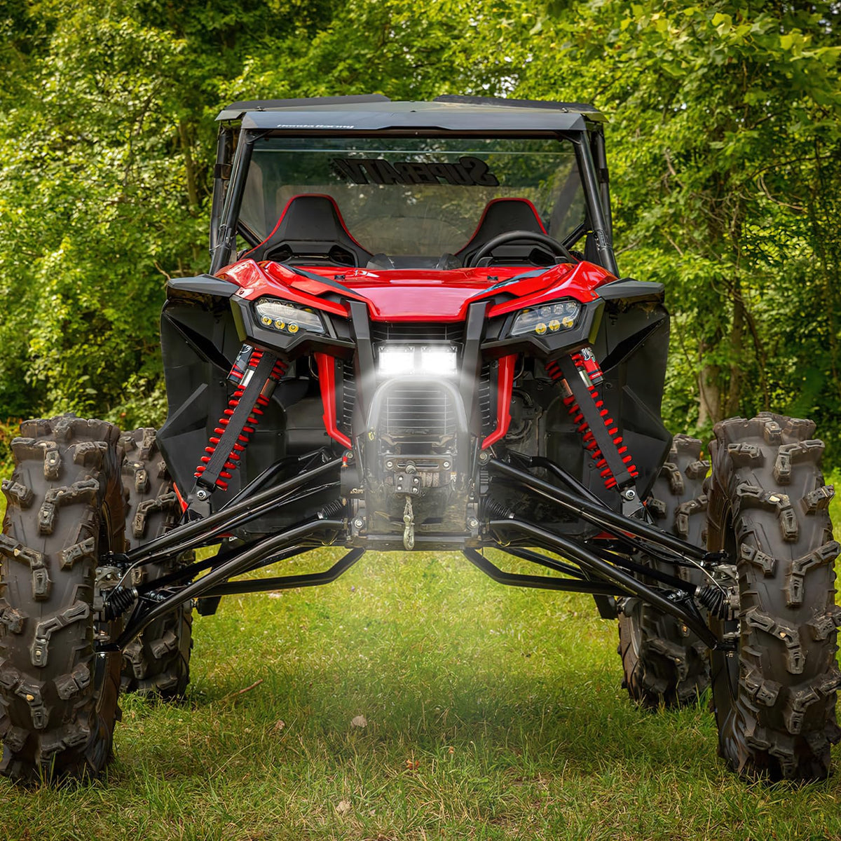 Nilight held in hand for scale showing compact size and versatile mounting benefit