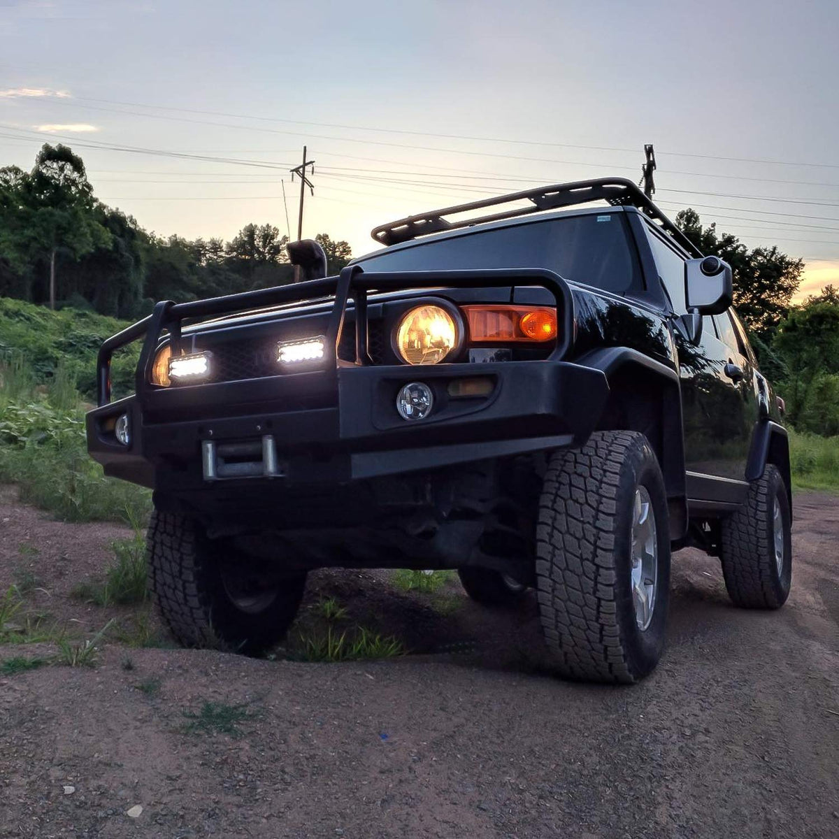 Nilight on a utility vehicle at a worksite providing wide-area lighting for tasks and campsite setup