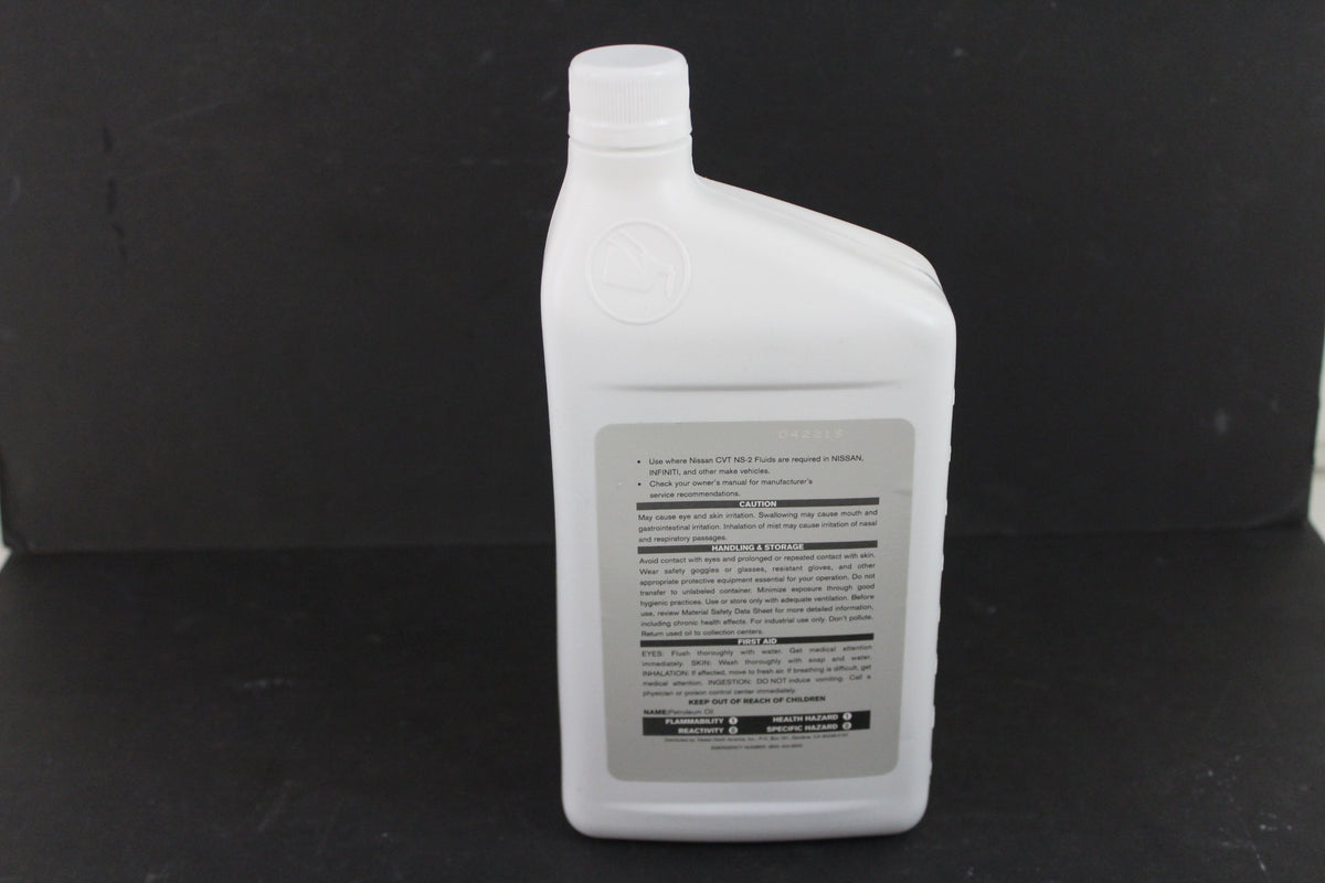 Pouring NISSAN 999MP-CV0NS2 into transmission funnel demonstrating correct fluid use and protection
