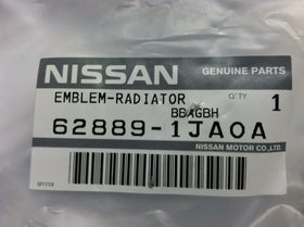 NISSAN emblem installed on vehicle showing restored grille aesthetics and easy upgrade