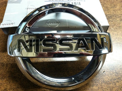 NISSAN front grille emblem front view showing correct OEM fit and restored appearance