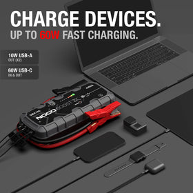 NOCO Boost X GBX155 charging a laptop via 60W USB-C showing high-speed device charging
