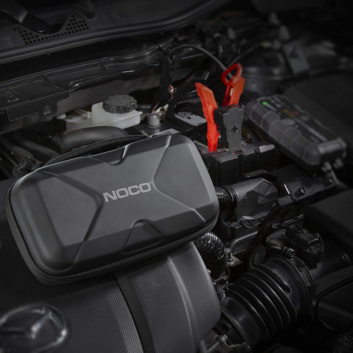 NOCO carrying case in hand demonstrating portability and convenience