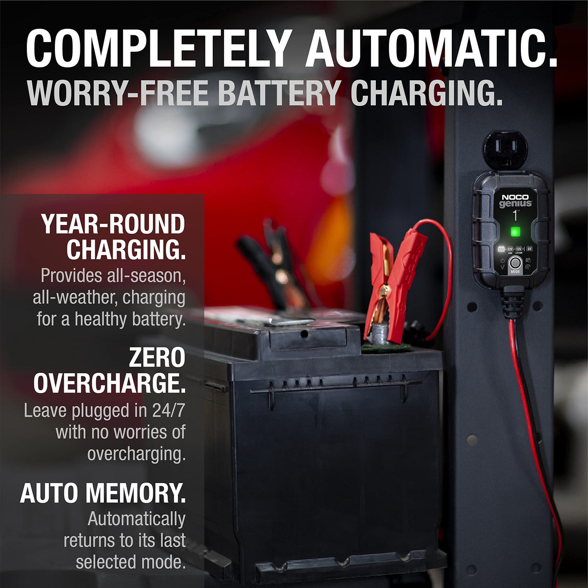 NOCO GENIUS1 box contents spread out showing included charger, cables, clamps, and warranty documentation