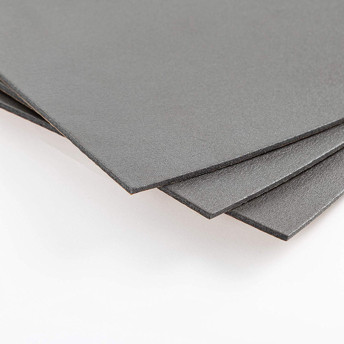 Noico Red adhesive backing peeled to show peel-and-stick convenience and strong bond