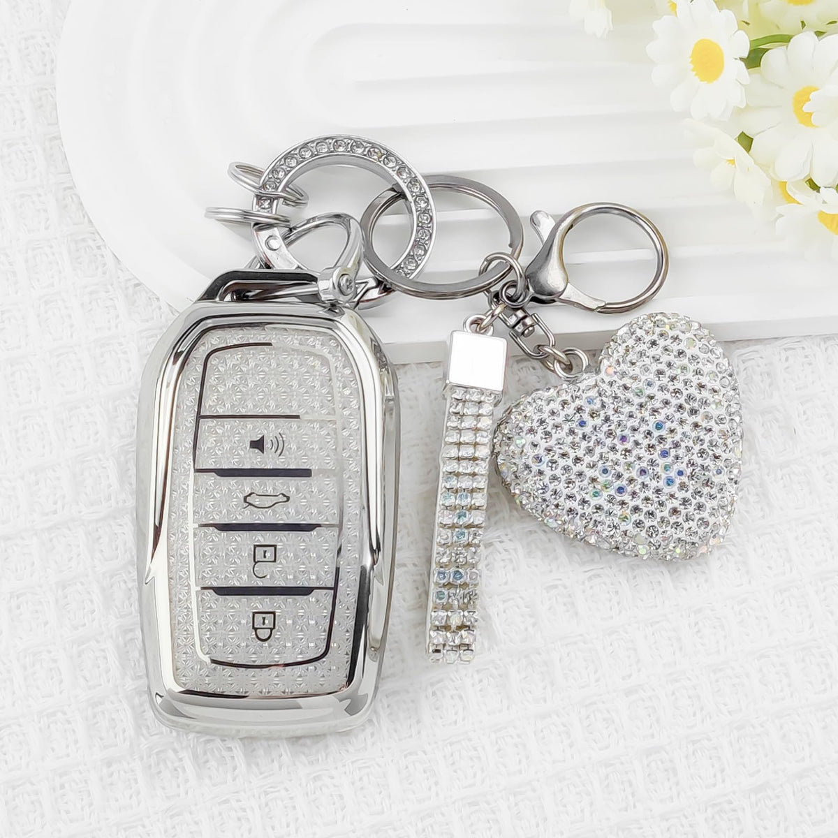 Nomiyo heart keychain on white background demonstrating removable bling charm