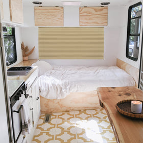 NOVINO blind half lowered illustrating adjustable positioning for customized light