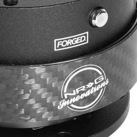 NRG Innovations carbon fiber ring close-up highlighting lightweight strength benefit