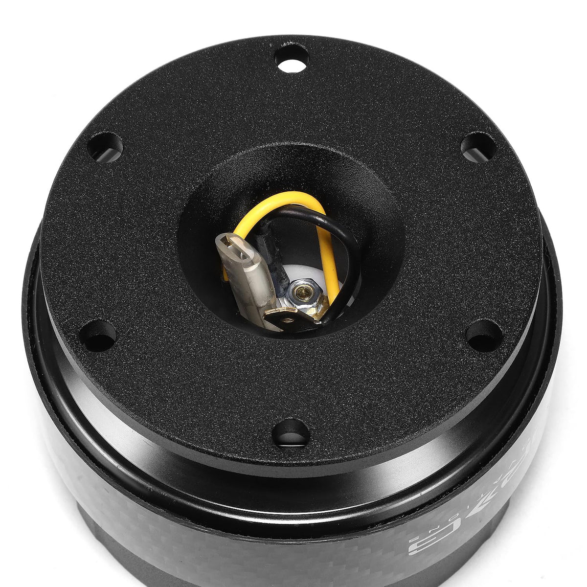 NRG Innovations installed in car with wheel removed demonstrating easy removal benefit