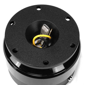 NRG Innovations installed in car cockpit demonstrating easy wheel removal benefit