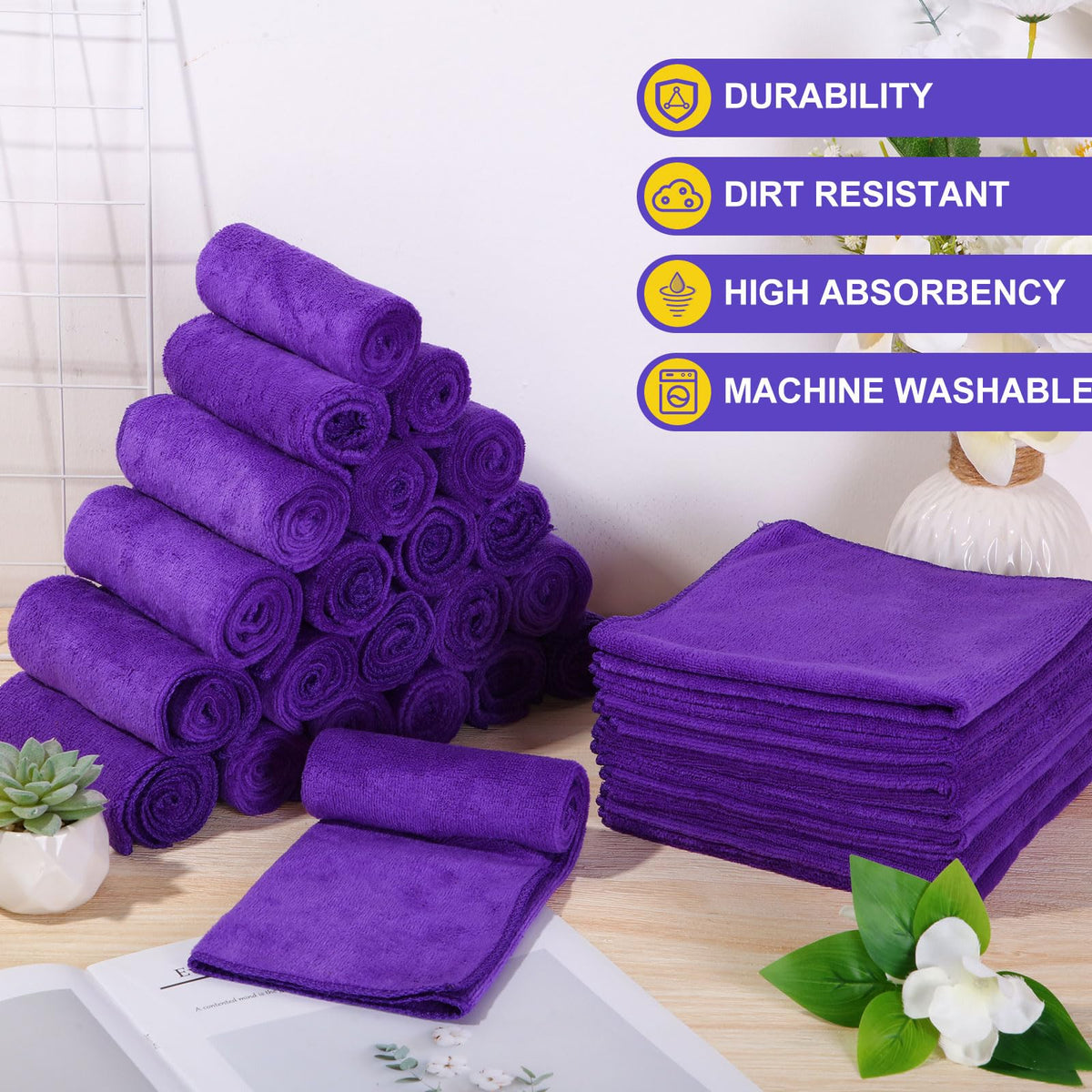 Nuenen towel held in hand showing 16x16 inch size and ergonomic handling benefit