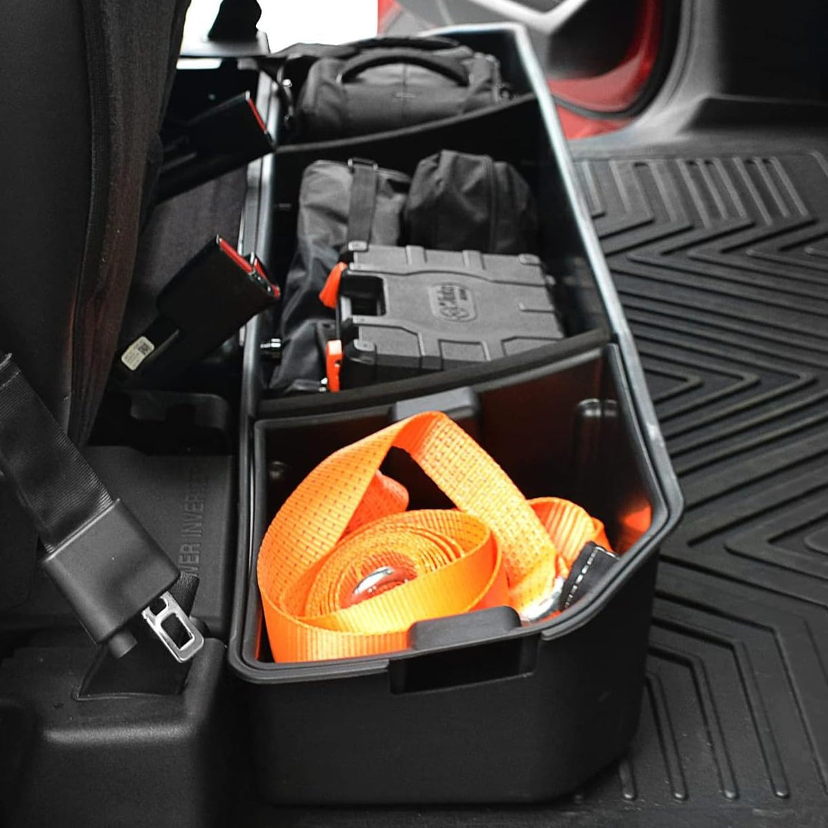 OEDRO under-seat front view showing flush fit and hidden storage benefit