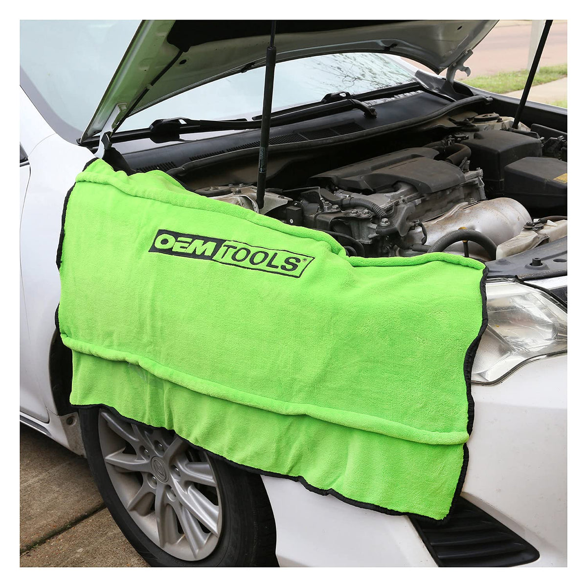 OEMTOOLS in a busy garage showing cover in everyday mechanic use