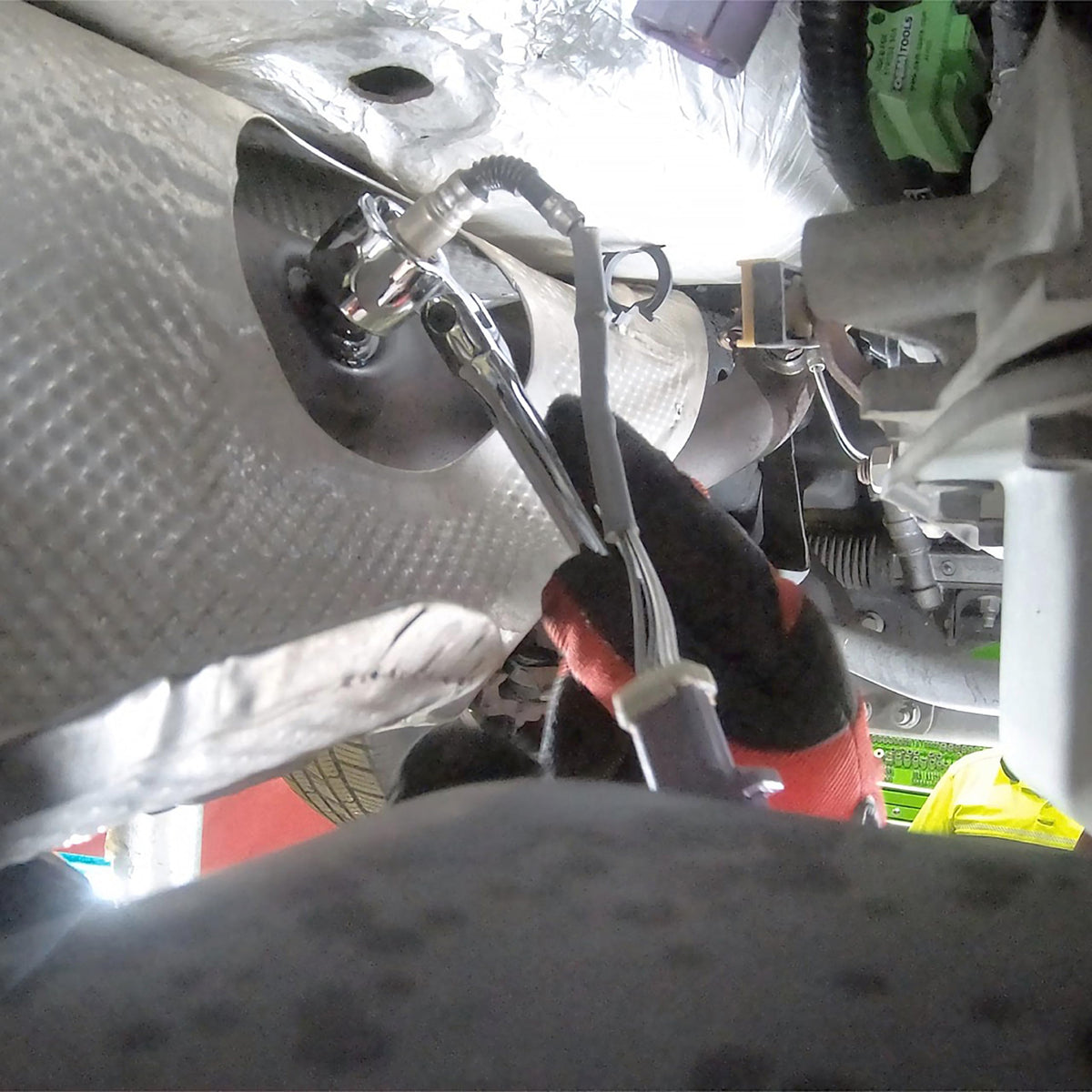 OEMTOOLS wrench in use on Ford exhaust sensor for easier removal