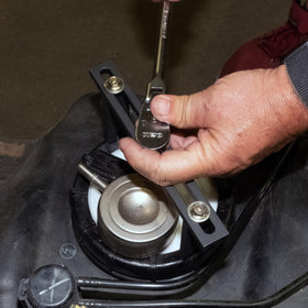 OEMTOOLS engaged on a fuel module retaining ring illustrating safe ring removal