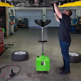 OEMTOOLS in garage setting under vehicle demonstrating practical oil-change use