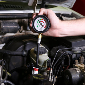 OEMTOOLS mechanic using kit in garage demonstrating efficient testing